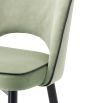 Pistachio green velvet set of 2 dining chairs with faux leather piping an d gold caps on black frame