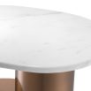 A brushed brass and white marble side table