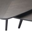 A stylish set of two dark brown wood coffee tables 