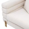 Luxurious modern armchair with brushed brass legs