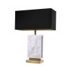 white marble lamp with black lampshade and brass accents 