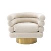 luxury swivel chair with boucle cream upholstery and brass base