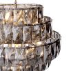 A gorgeous tiered chandelier in a smoked glass finish