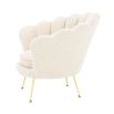 art deco-inspired boucle trapezium armchair with brass legs
