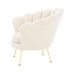 art deco-inspired boucle trapezium armchair with brass legs