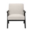 A luxurious boucle armchair with black legs 