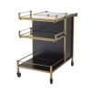 A luxurious dark grey and brushed brass drinks trolley