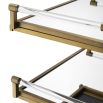 A luxurious dark grey and brushed brass drinks trolley