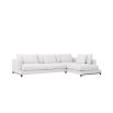 A luxurious white contemporary lounge sofa with scatter cushions