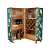 A stylish wine cabinet by Eichholtz with a mustique green fabric upholstery