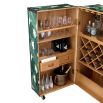 A stylish wine cabinet by Eichholtz with a mustique green fabric upholstery