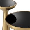 Eichholtz modern brushed brass side table with black glass surface