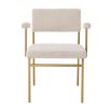 Modern cream boucle upholstered chair with brushed brass finish by Eichholtz