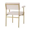 Modern cream boucle upholstered chair with brushed brass finish by Eichholtz