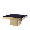 Eichholtz brushed brass coffee table with square black marble effect tabletop