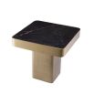 Luxurious Eichholtz brushed brass side table with a chunky solid frame and black marble effect tabletop