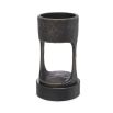 A vintage style bronze candle holder with a granite base