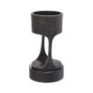 A vintage style bronze candle holder with a granite base