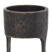 A vintage style bronze candle holder with a granite base