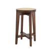 A stylish Scandinavian-inspired rattan counter stool with a brown finish