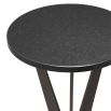 A dark-featured, granite and bronze side table