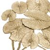 A glamorous nature-inspired side table with a surface of lilypads and branch-like legs