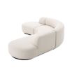 An exquisite, contemporary curved sofa with boucle upholstery