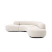 An exquisite, contemporary curved sofa with boucle upholstery