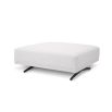A luxurious, upholstered ottoman with white fabric and black feet