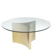 White coffee table with circular glass top and brushed brass frame