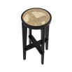 A chic black Scandinavian-inspired bar stool with rattan cane webbing