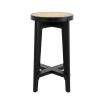 A chic Scandinavian-inspired rattan counter stool with a black finish