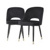 Set of 2 black velvet dining chairs with faux leather piping and golden detailing