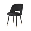 Set of 2 black velvet dining chairs with faux leather piping and golden detailing