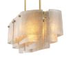 A dazzling handblown glass and brushed brass luxury chandelier