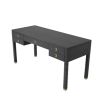 A luxurious charcoal grey luxury desk with a ribbed design and bronze accents 