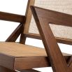 An iconic brown mindi wood and rattan chair with x-shaped legs