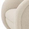Luxurious curvy natural faux fur swivel chair on brushed brass base by Eichholtz