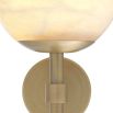 A luxurious antique brass wall lamp with an elegant, alabaster shade