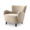 A luxurious fluffy cream-coloured mid-century inspired armchair