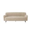 A luxurious mid-century modern inspired Canberra sand upholstered sofa with black legs