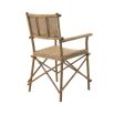 A stylish handwoven natural rattan armchair