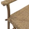 A stylish handwoven natural rattan armchair