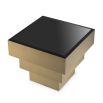Contemporary luxe brass coffee table with black glass surface by Eichholtz