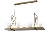 Eichholtz light brushed brass chandelier with a shelf of clear glass faux candle shades 