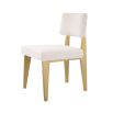 A luxurious modern brushed brass and boucle dining chair 