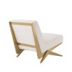 Modern Eichholtz boucle cream chair with brushed brass accents