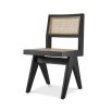 A gorgeous classic black rattan dining chair 