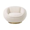 A sumptuous swivel chair by Eichholtz with a chic circular design, beautiful boucle cream upholstery and glamorous brushed brass base