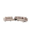 A glamorous sand-coloured corner sofa with contrasting black legs